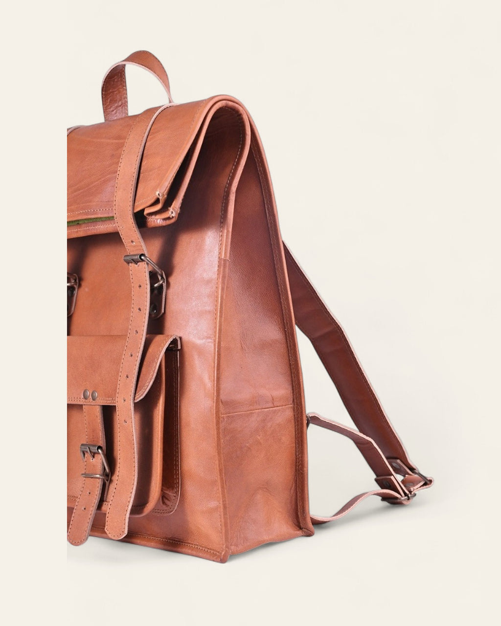 The Sariska Backpack — side view with padded leather shoulder straps