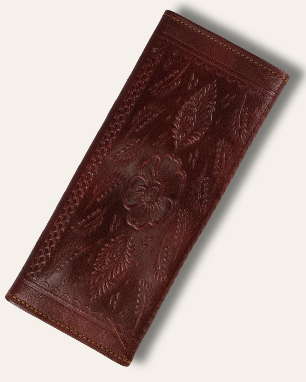 A real leather Ladies clutch or purse in cherry red color