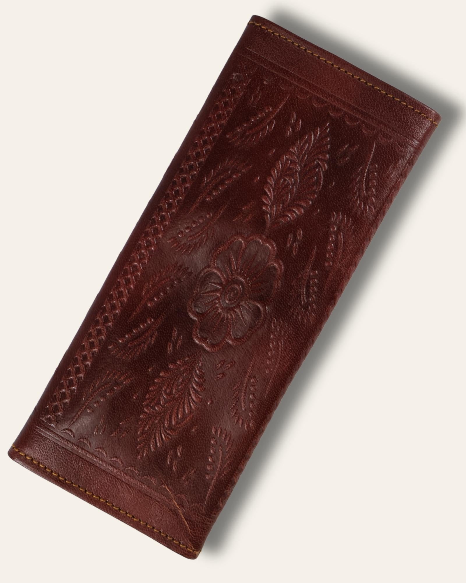 A real leather Ladies clutch or purse in cherry red color