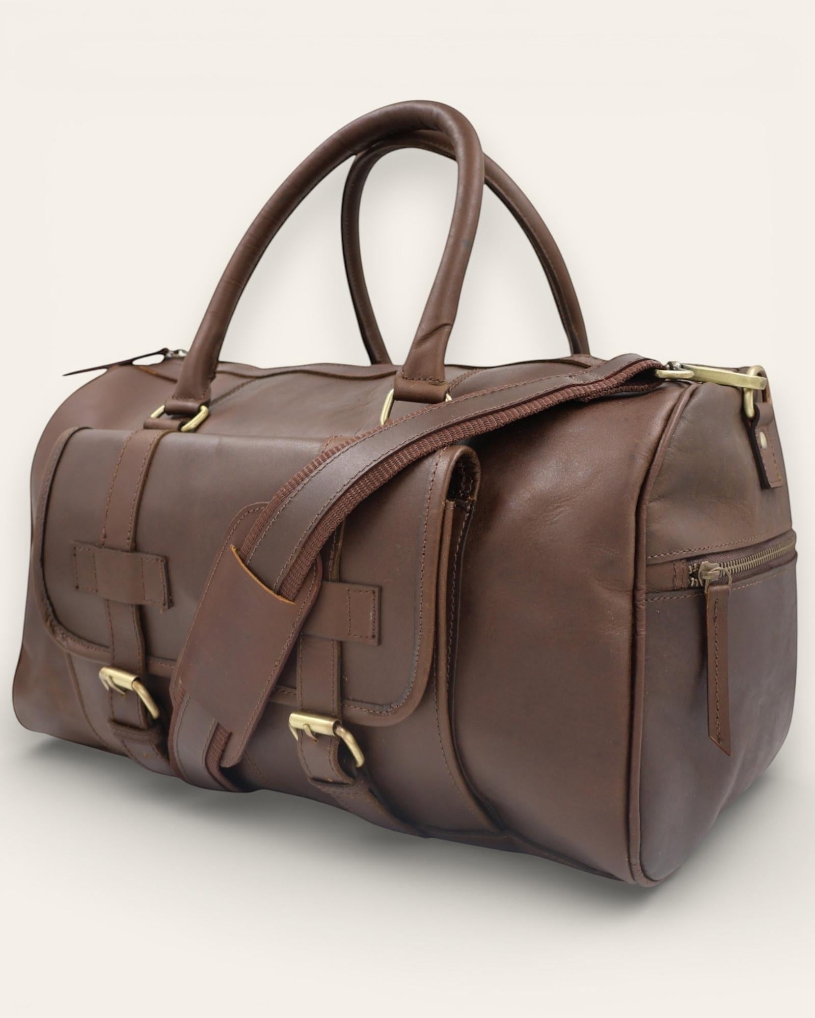 Classic, vintage, hunter leather duffel bag in dark brown color