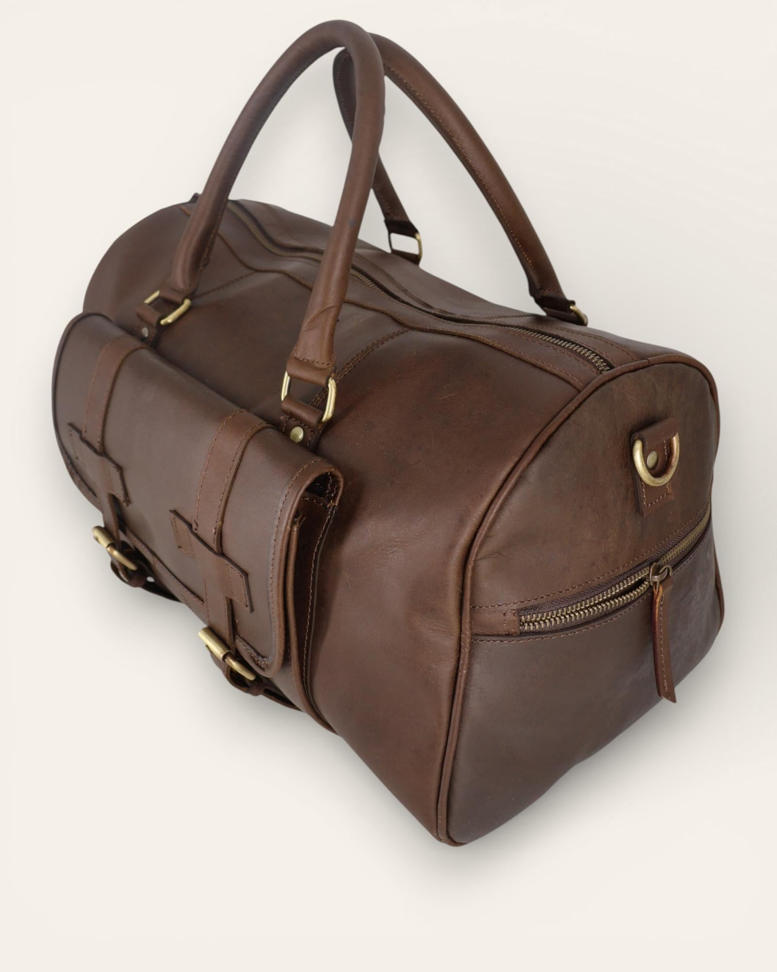 Classic, vintage, hunter leather duffel bag in dark brown color