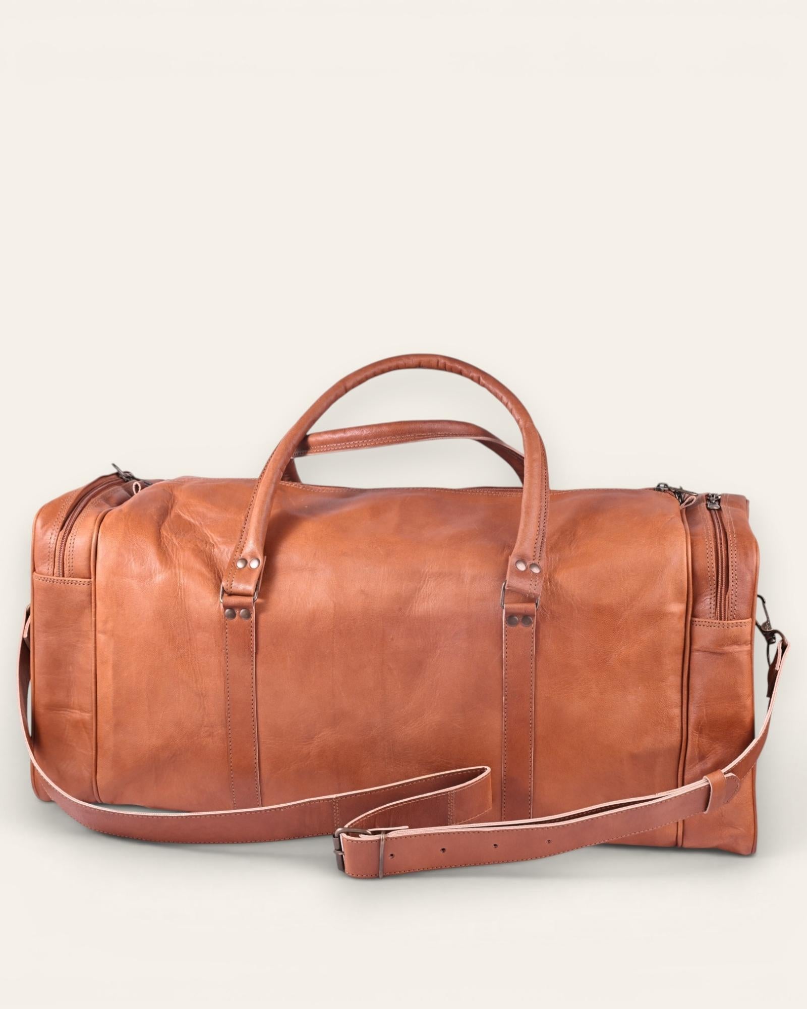 A real leather tan color duffel bag. spacious and premium