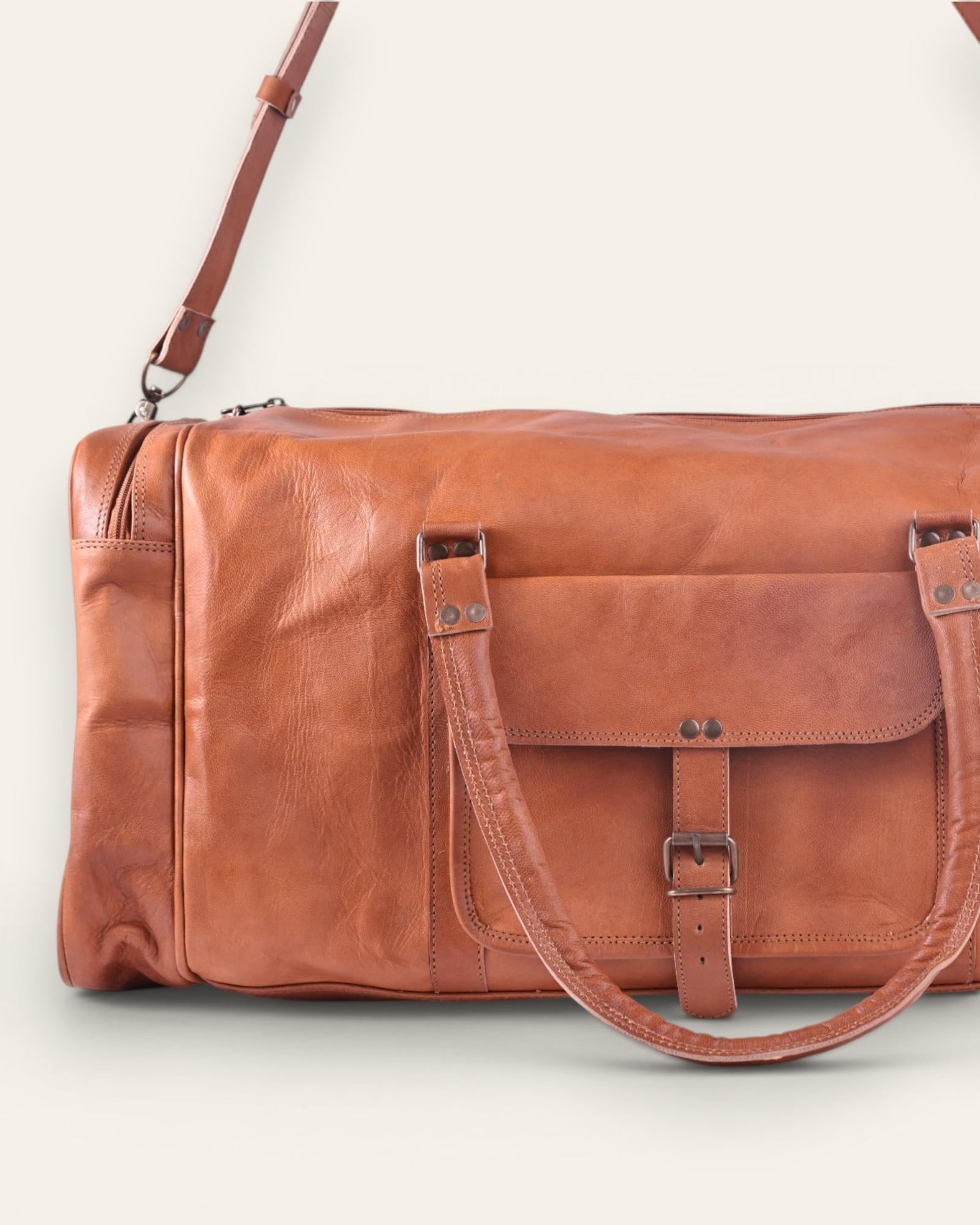 A real leather tan color duffel bag. spacious and premium