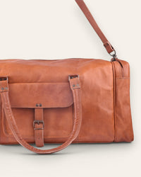 A real leather tan color duffel bag. spacious and premium