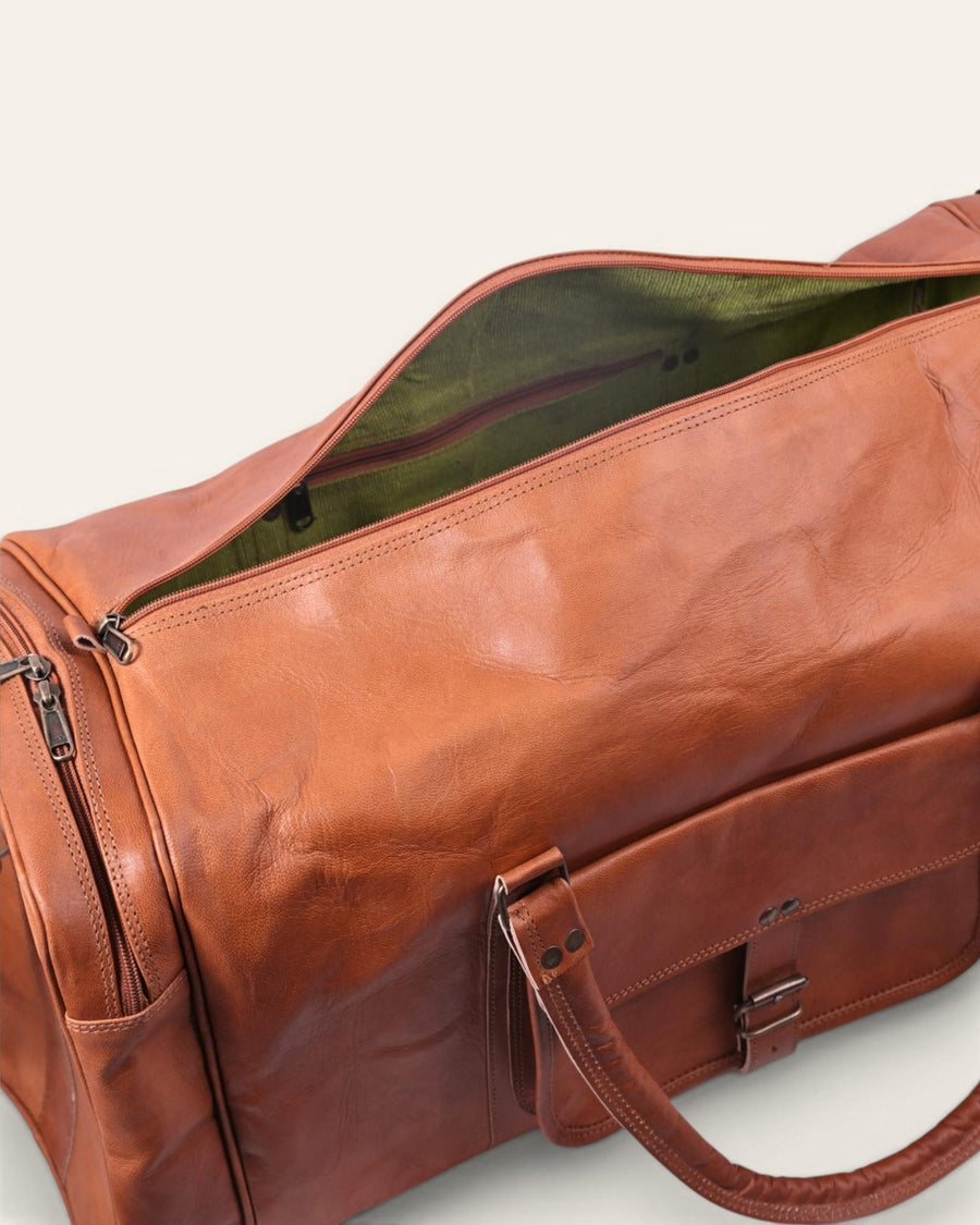 A real leather tan color duffel bag. spacious and premium