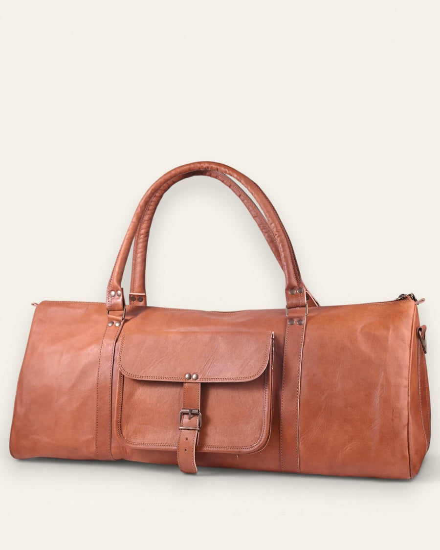 A triangle shapped duffel bag in real tan leather color