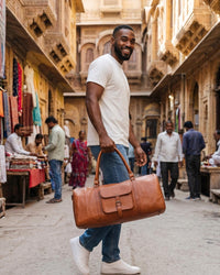 A triangle shapped duffel bag in real tan leather color