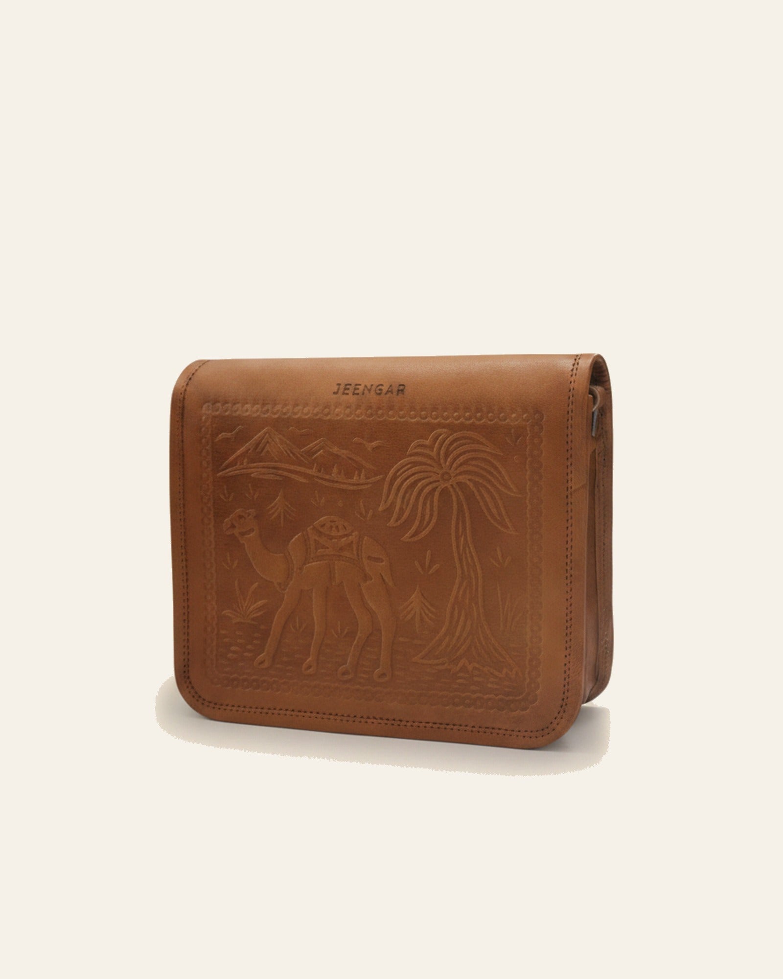 The Jaisalmer Sling in Tan — heritage embossed full-flap leather cross-body