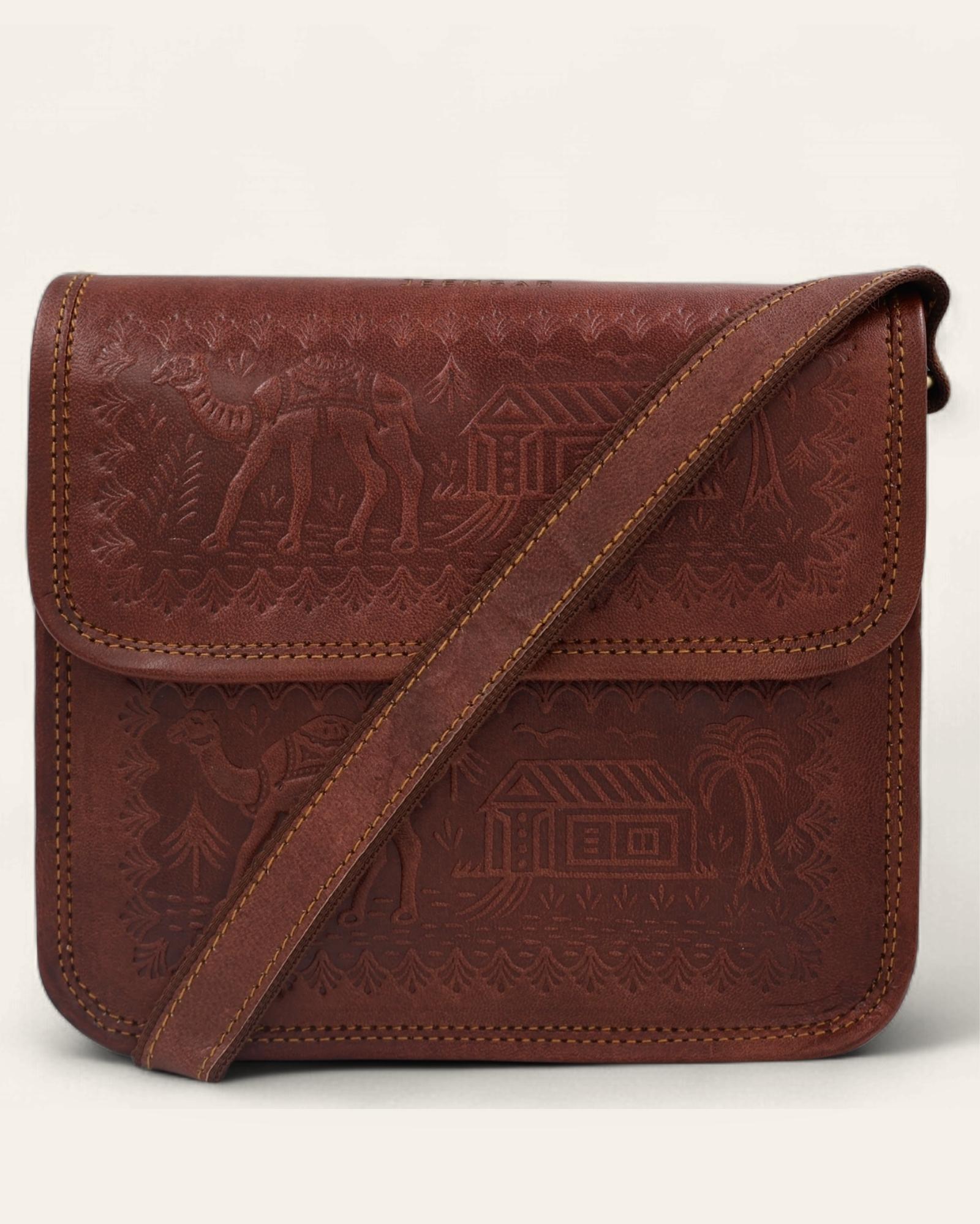 A red leather bag, best for daily errands, handmade in Rajasthan by Jeengar Mochi