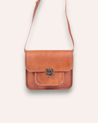 A real leather sling bag in tan color