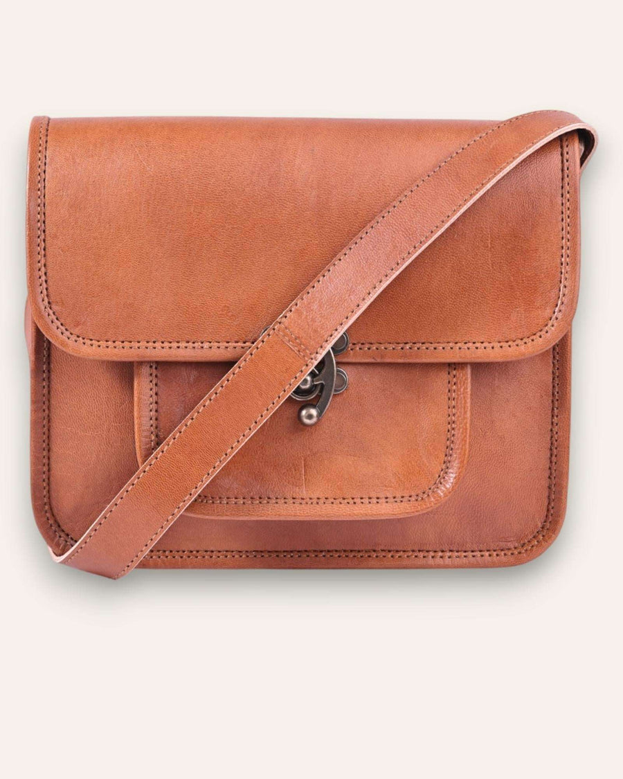 A real leather sling bag in tan color