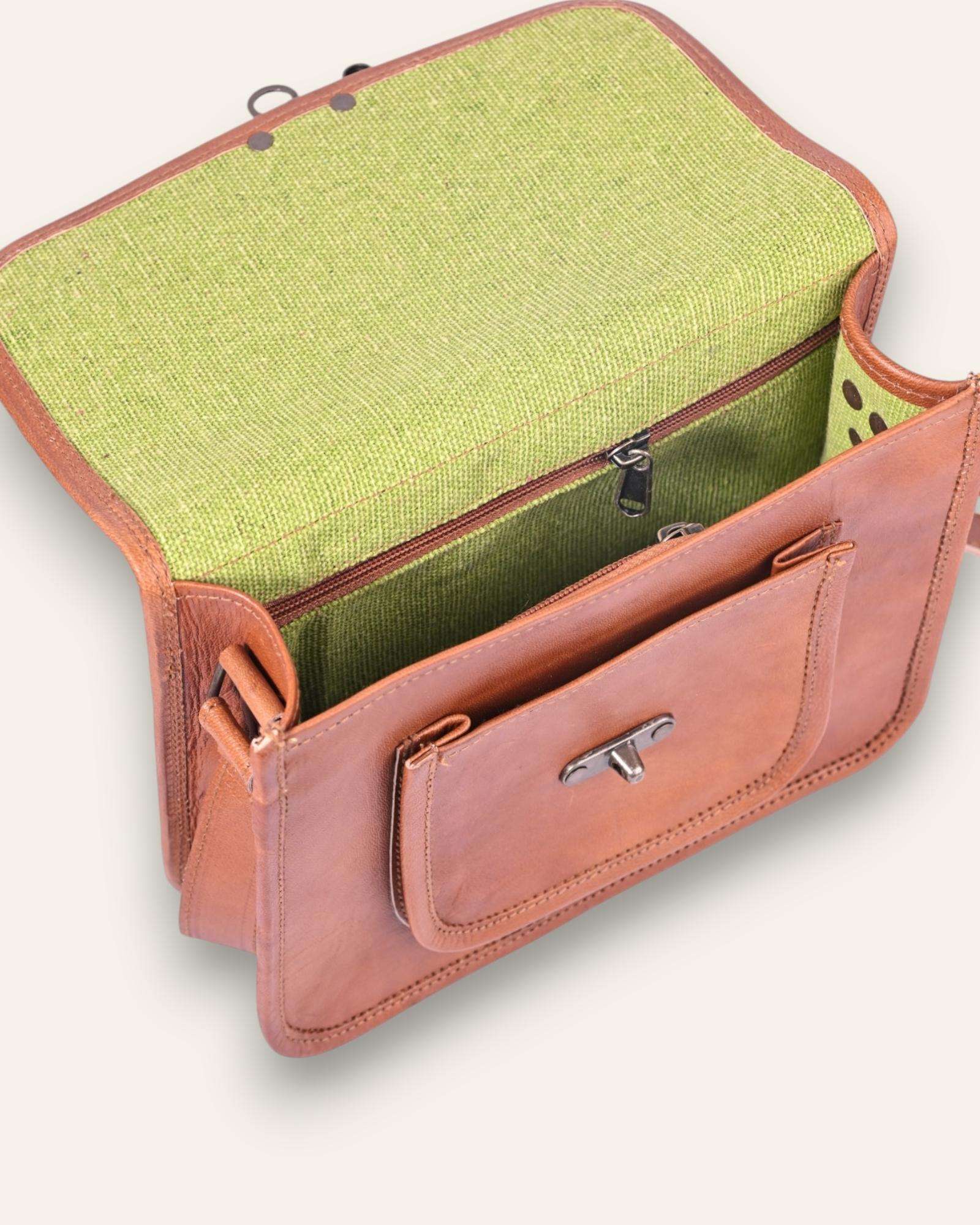 A real leather sling bag in tan color