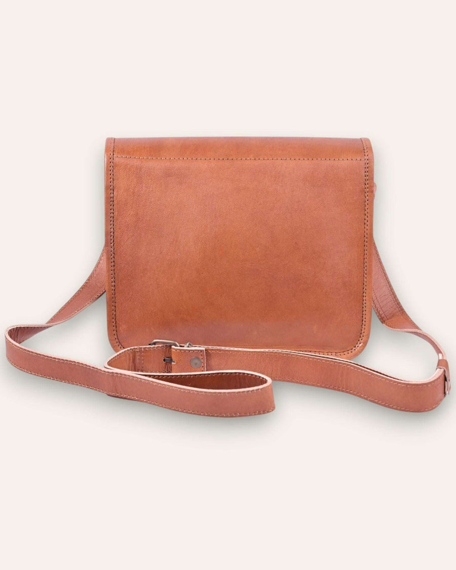 A real leather sling bag in tan color