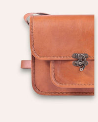 A real leather sling bag in tan color