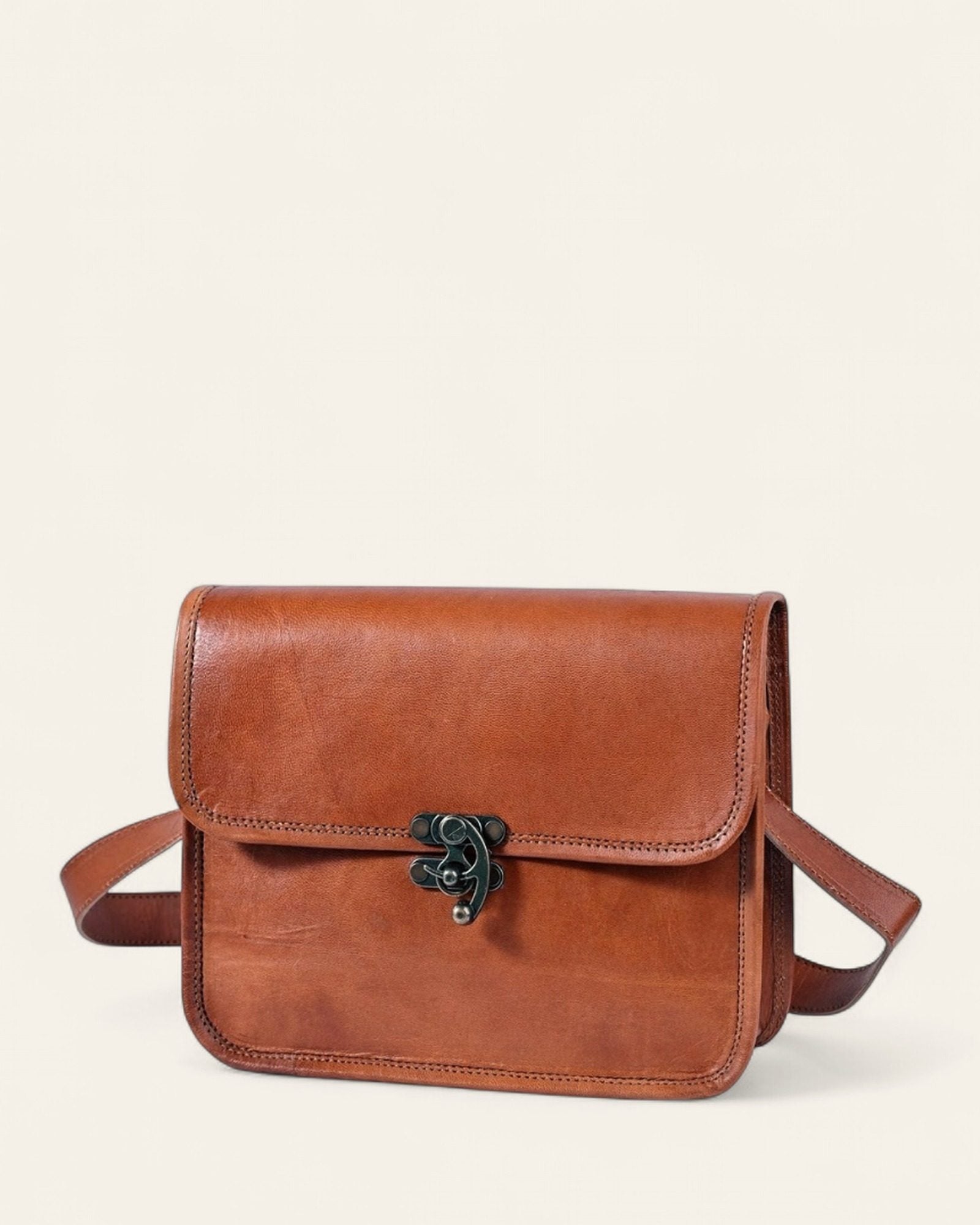 Tan natural leather sling, front with swing clasp — Jeengar