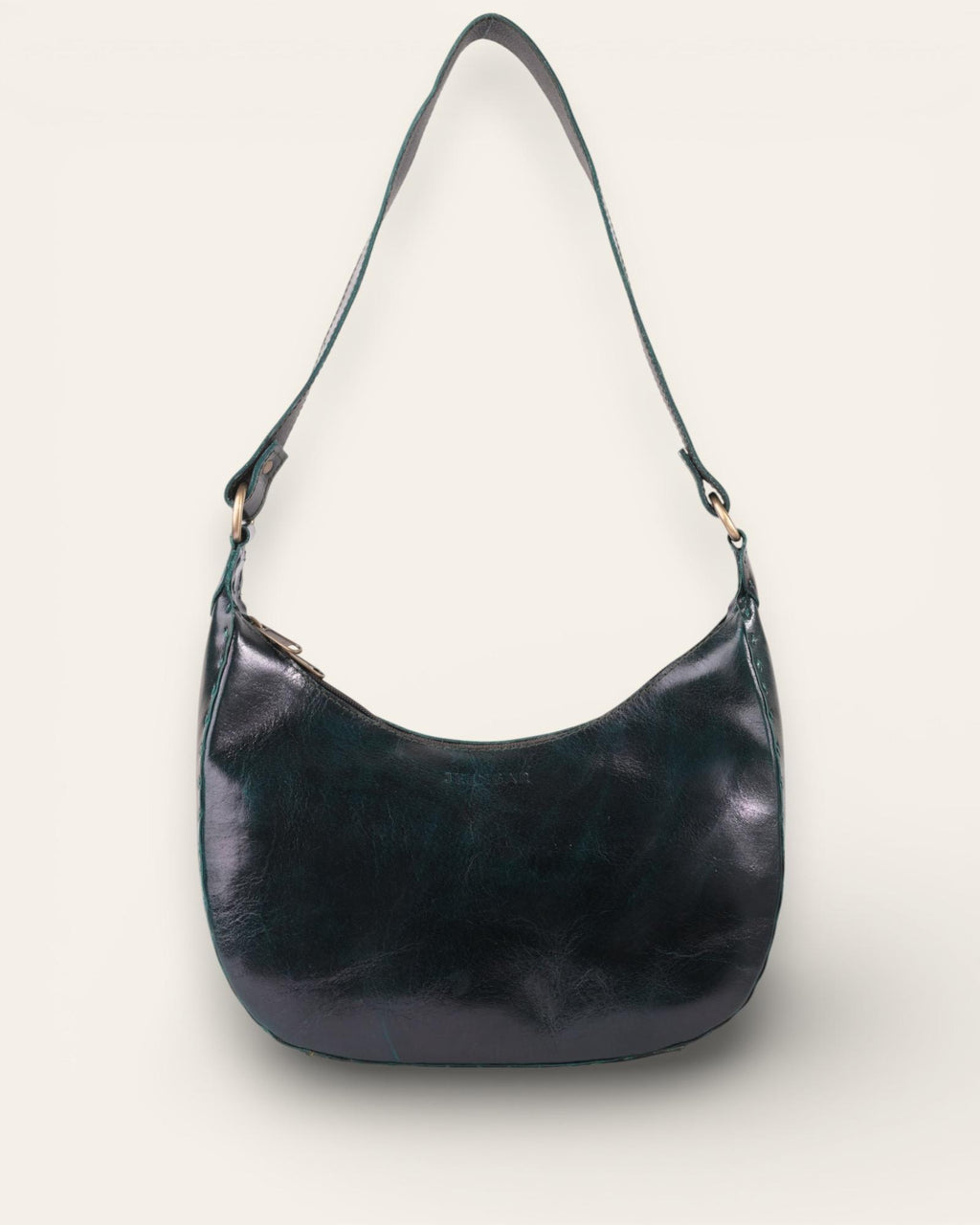 A dark green color real leather shoulder bag. It's spacious and beautiful.