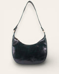 A dark green color real leather shoulder bag. It's spacious and beautiful.