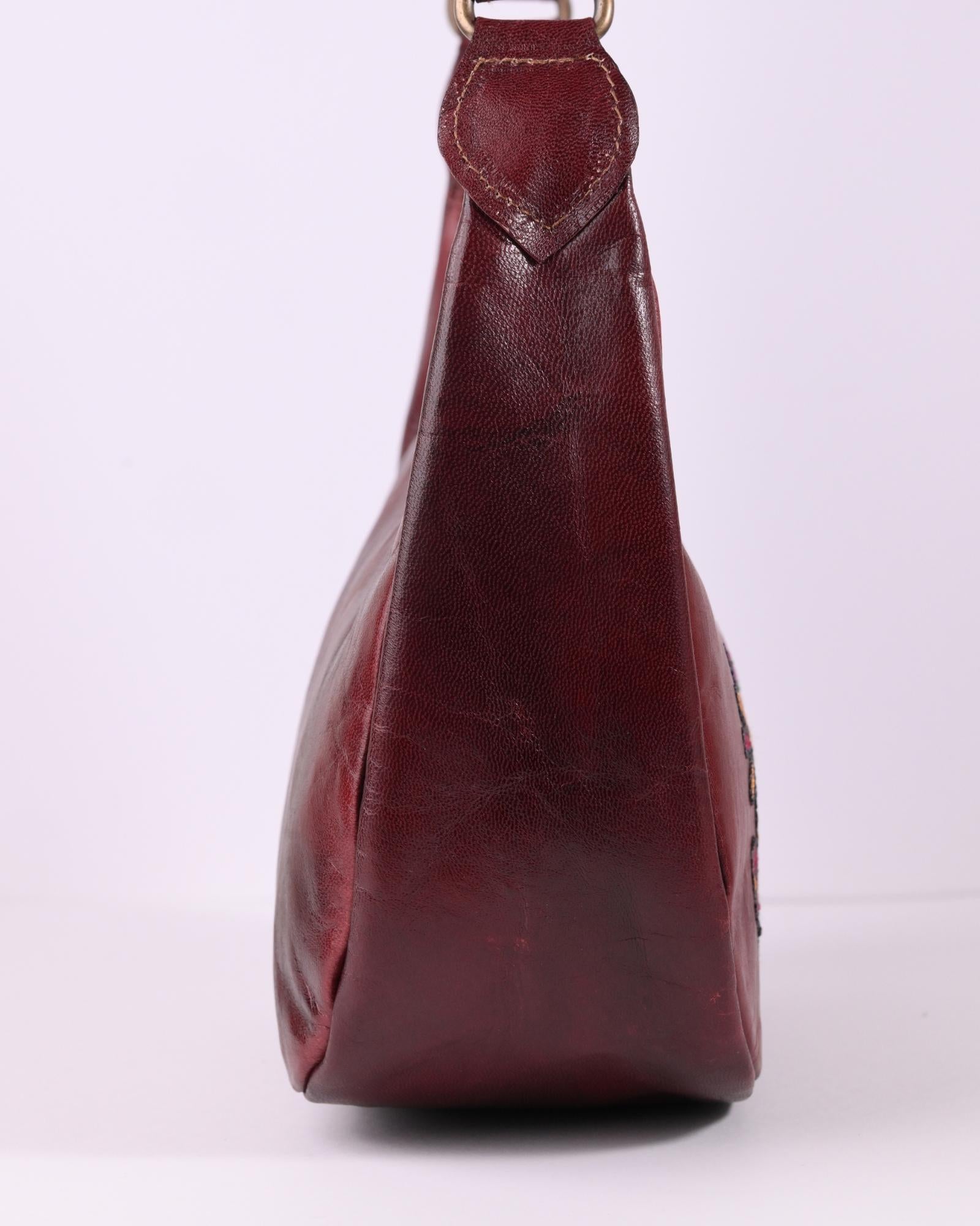 Red colour goat leather kashida shoulder bag