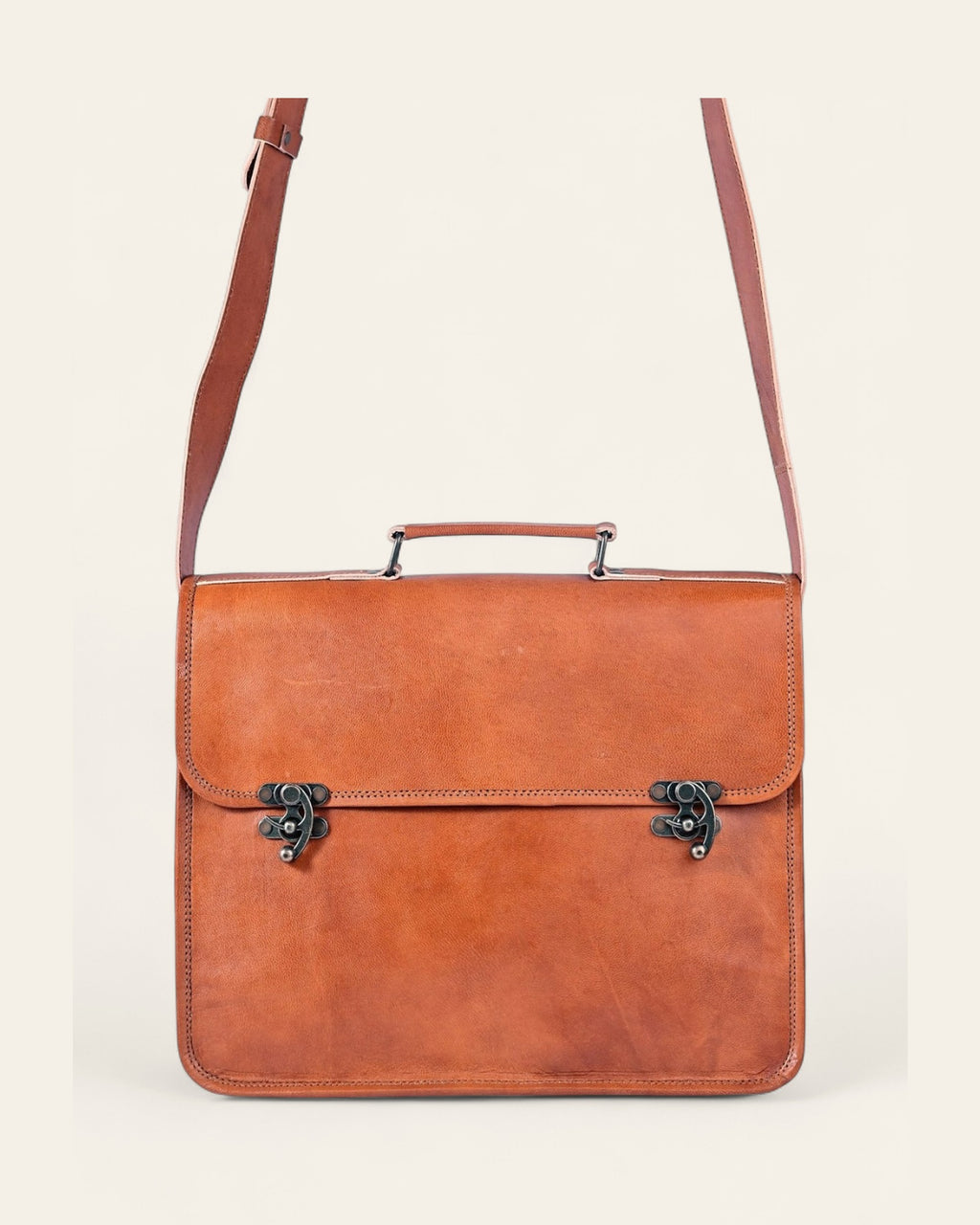 The Ajmer Laptop Bag, Twist-Lock style — full view with extended shoulder strap