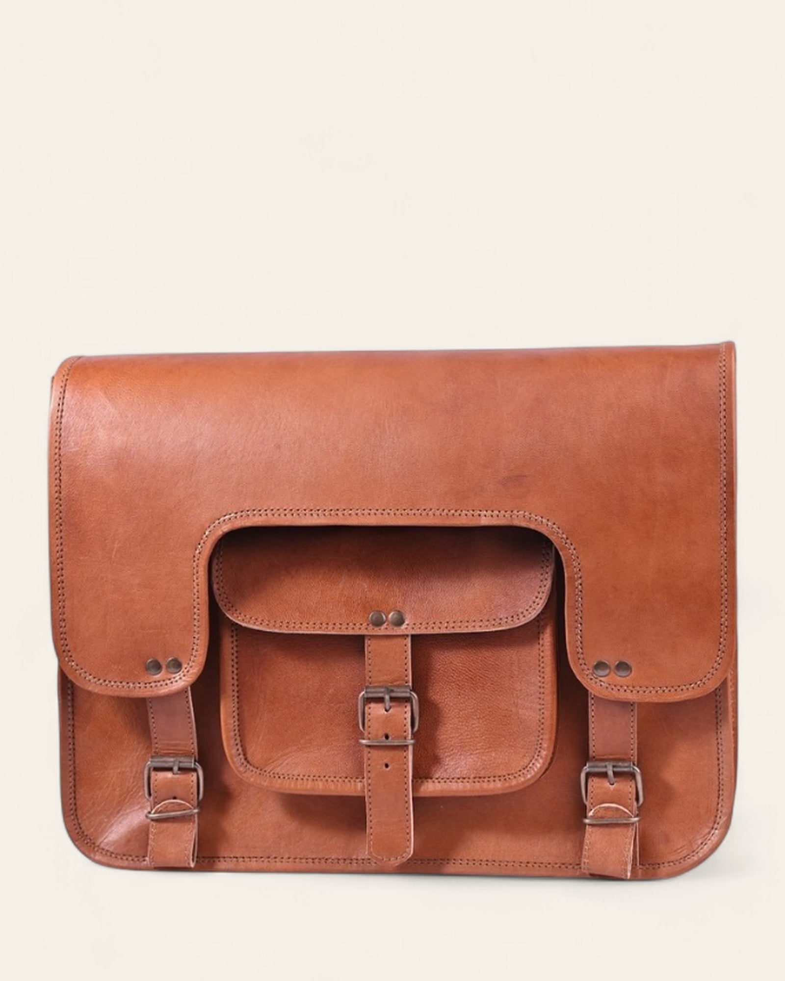 Front pocket and buckle detail of The Kota Laptop Bag