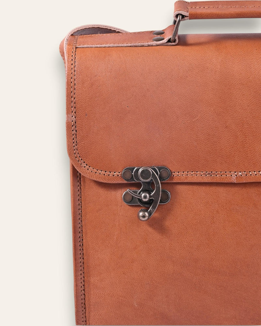 A real leather tan color briefcase, handmade in rajasthan india