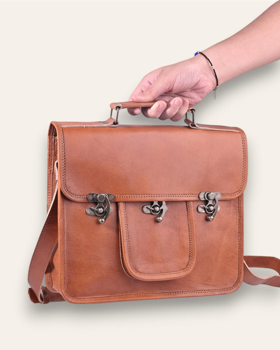 A real leather messenger bag with a pocket. Can fit an ipad.