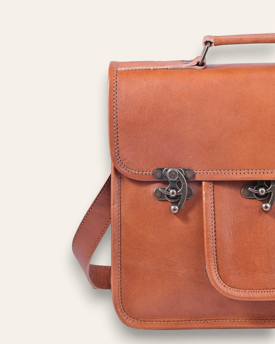 A real leather messenger bag with a pocket. Can fit an ipad.