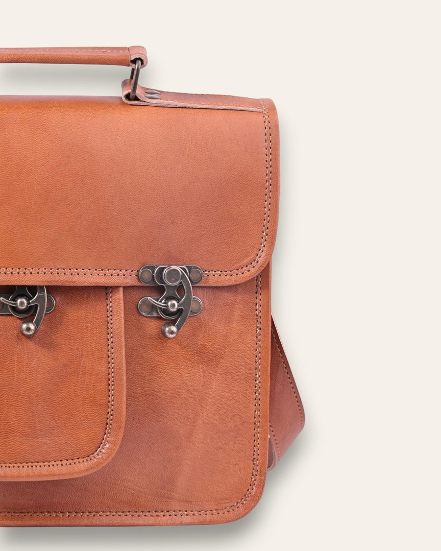 A real leather messenger bag with a pocket. Can fit an ipad.