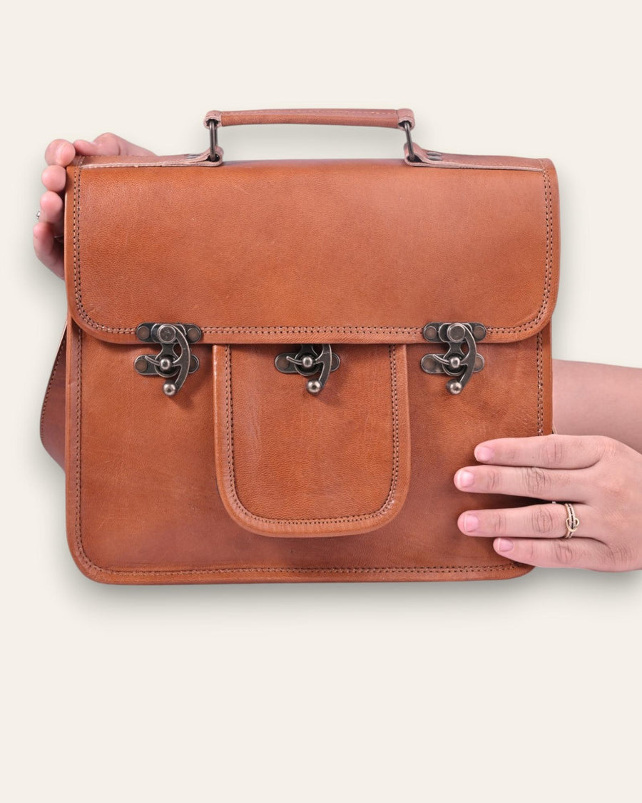 A real leather messenger bag with a pocket. Can fit an ipad.