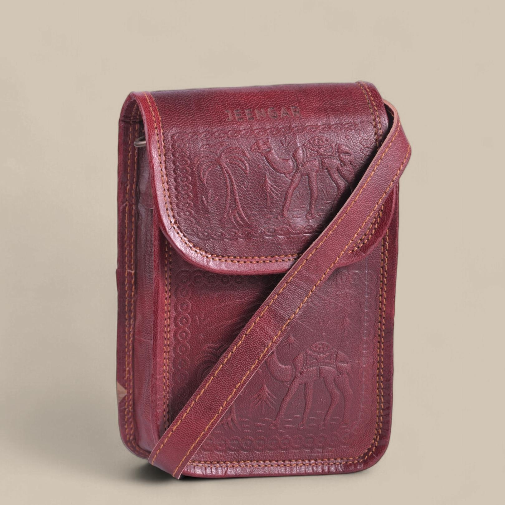 Cherry color handmade mobile leather sling bag. 