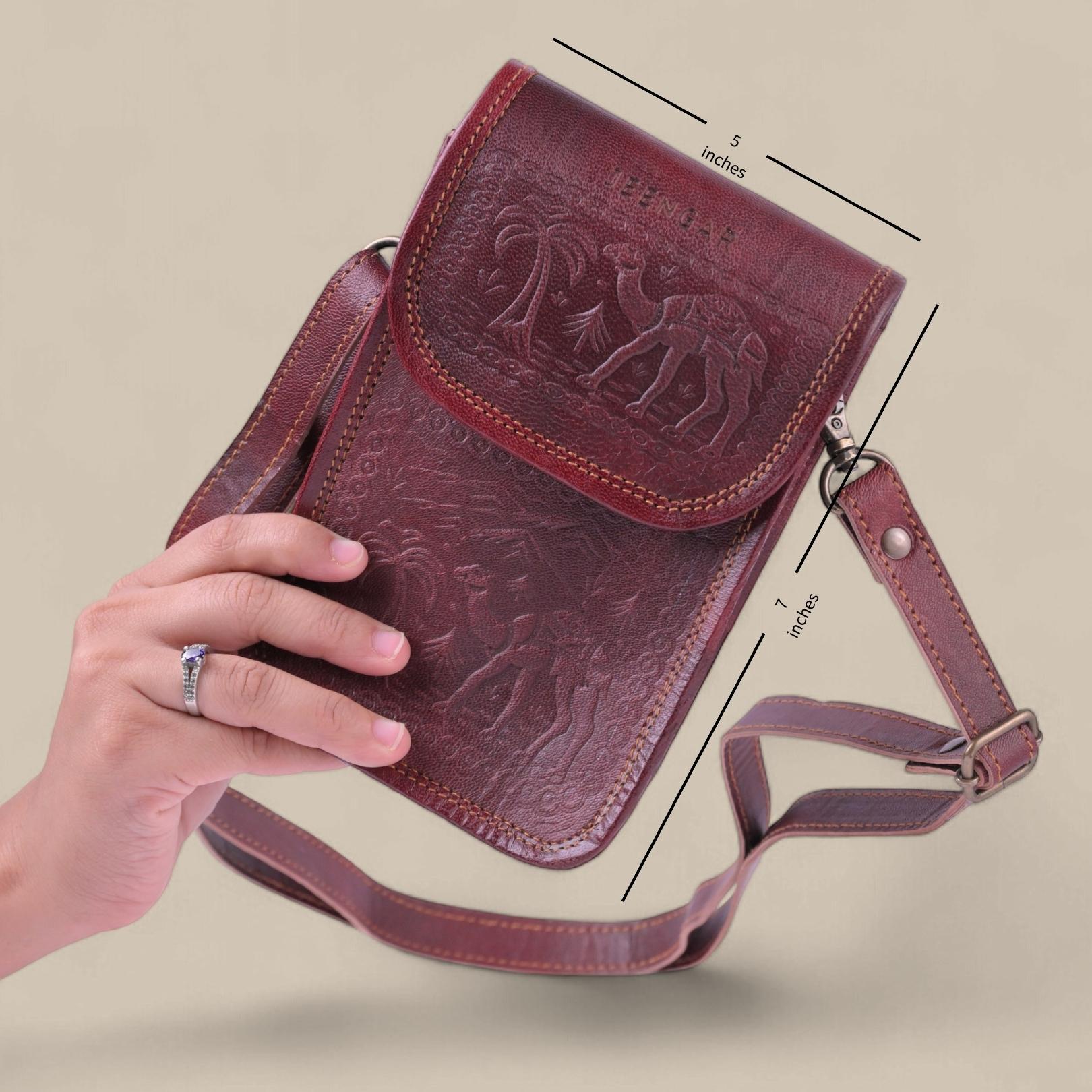 Cherry color handmade mobile leather sling bag. 