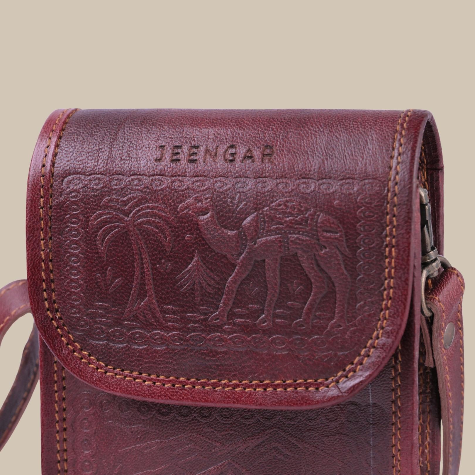 Cherry color handmade mobile leather sling bag. 