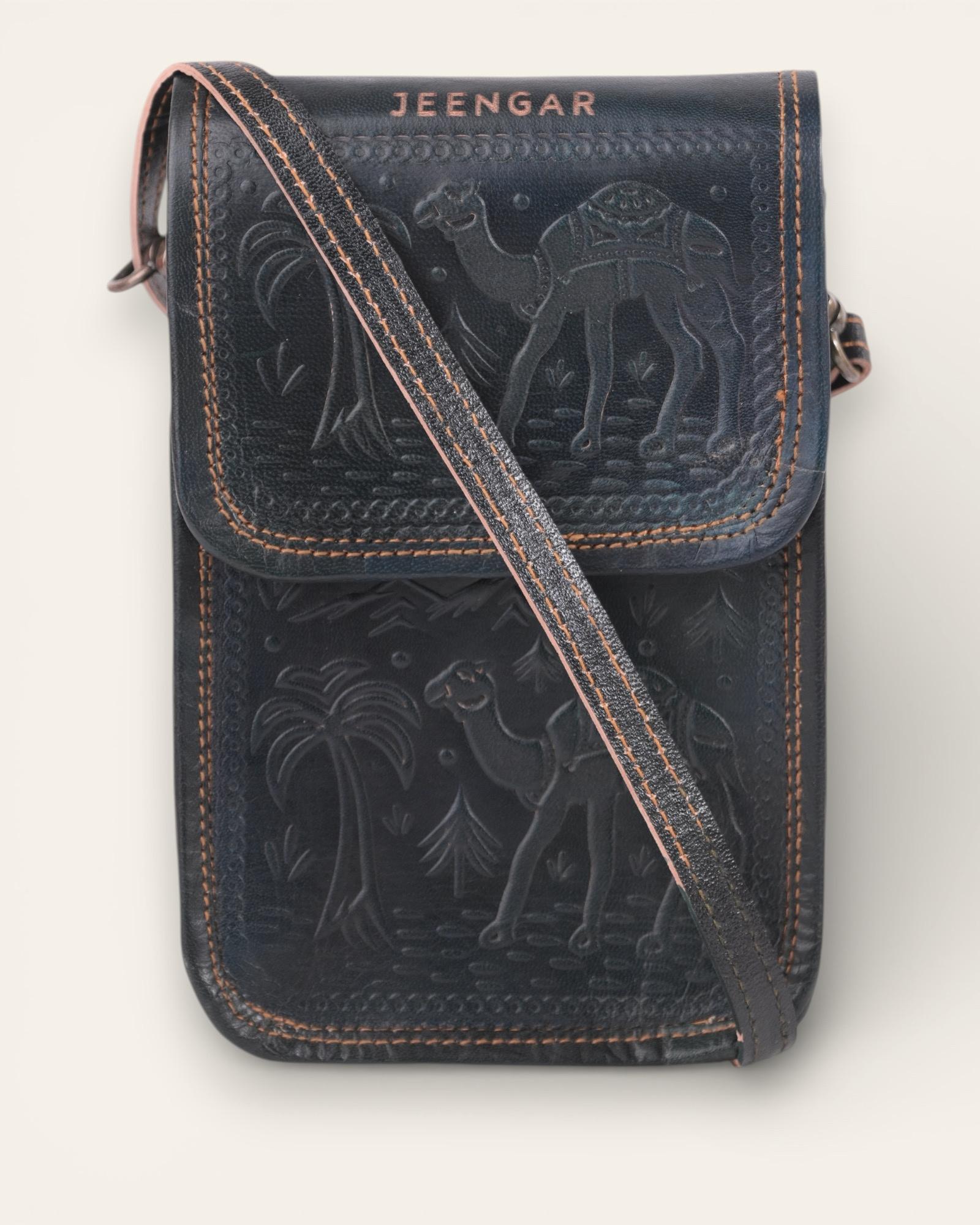 A compact mobile sling bag made with real leather, ideal for daily use
