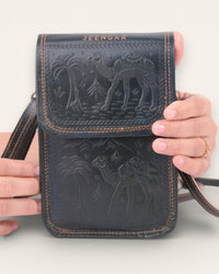 A compact mobile sling bag made with real leather, ideal for daily use