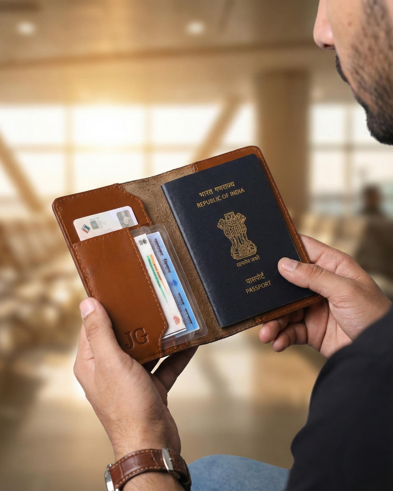 A real leather passport holder in brown color with multiple card slots and a cash slot