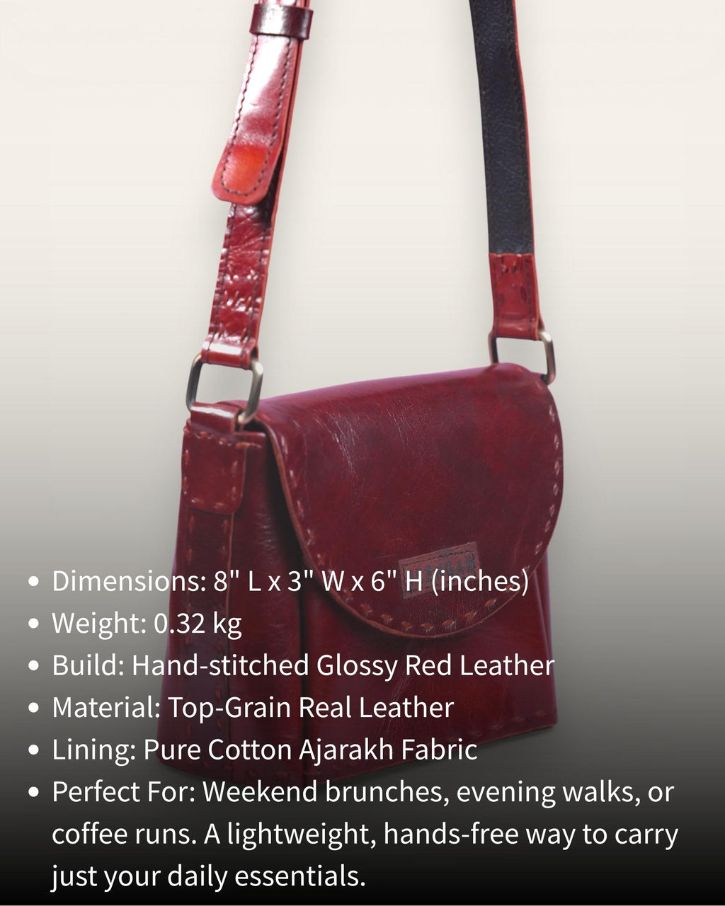 A red glossy small real leather sling bag, perfect for daily essentials