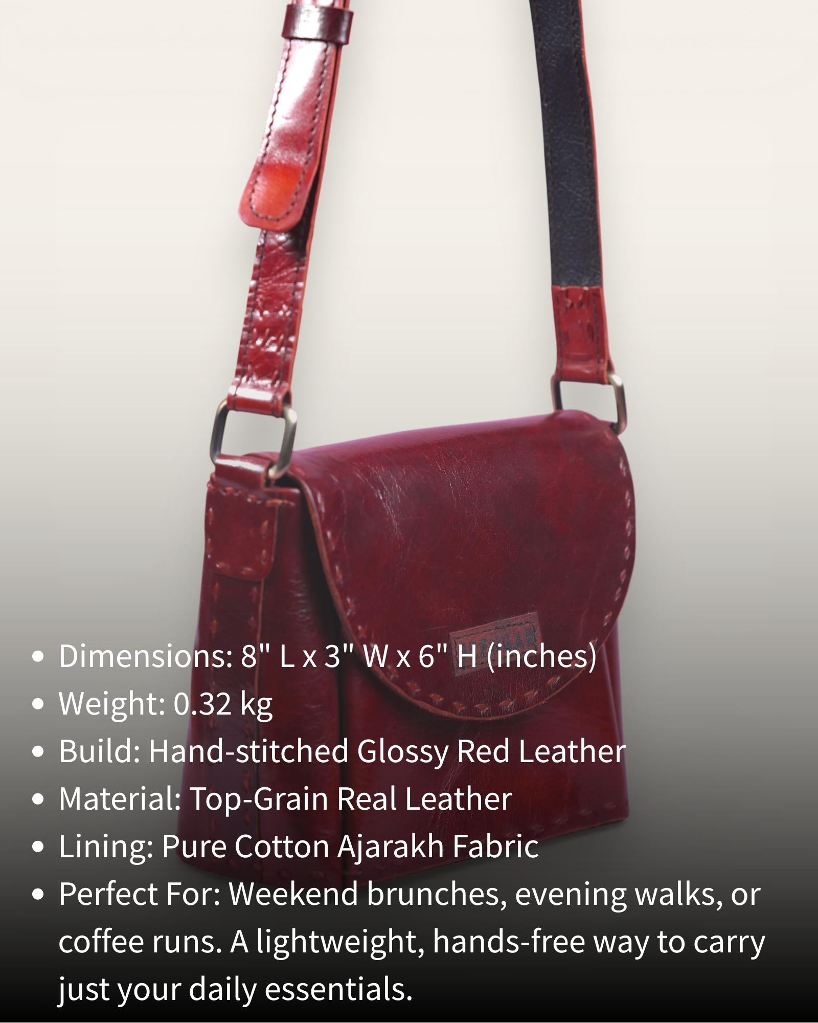 A red glossy small real leather sling bag, perfect for daily essentials
