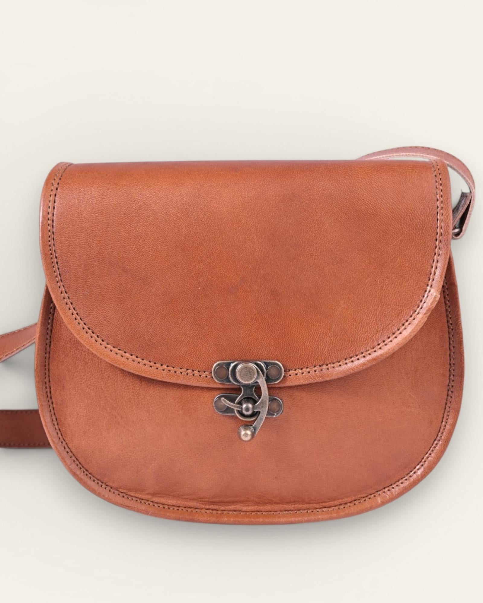 A real goat leather sling bag made in rajasthan