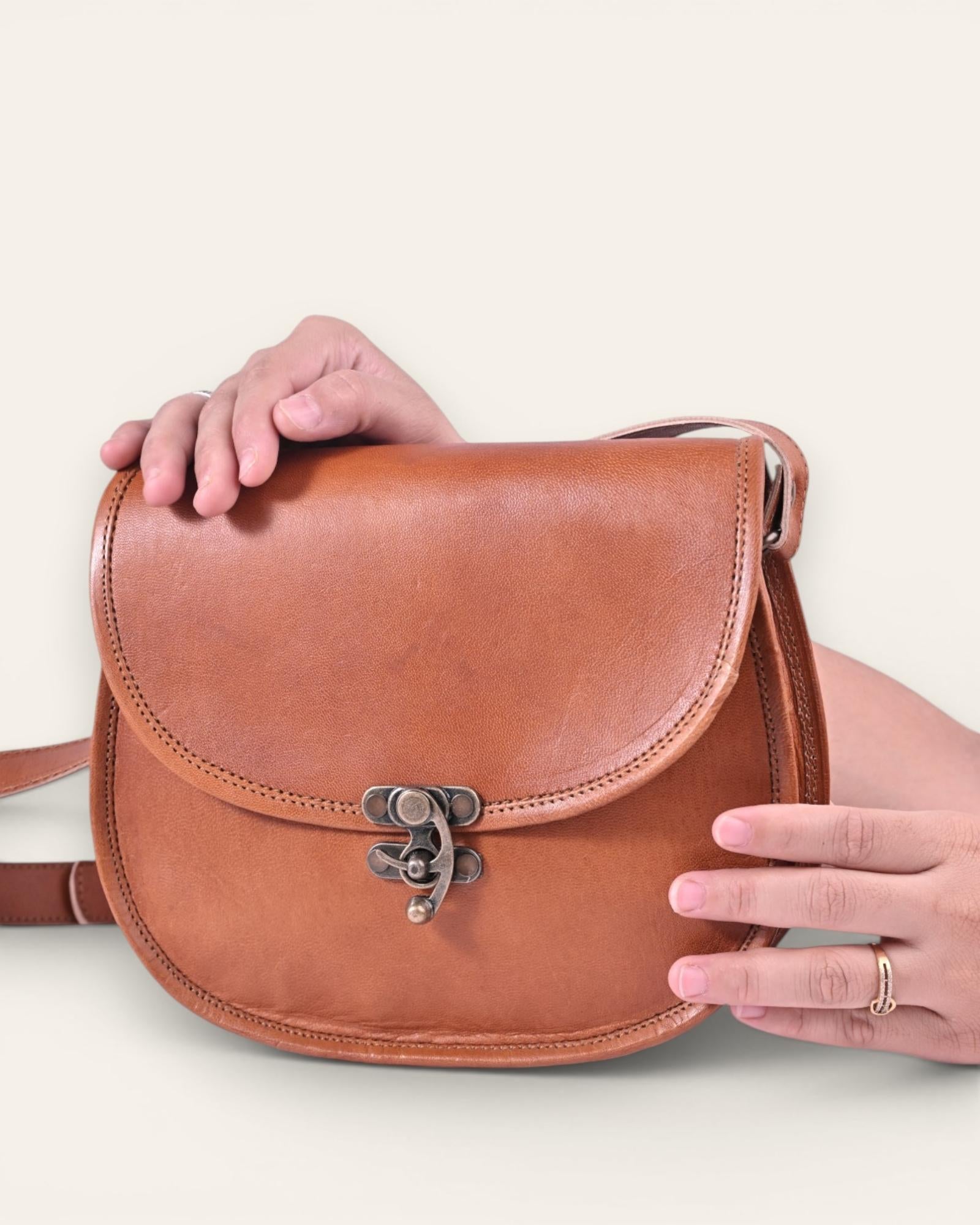 A real goat leather sling bag made in rajasthan