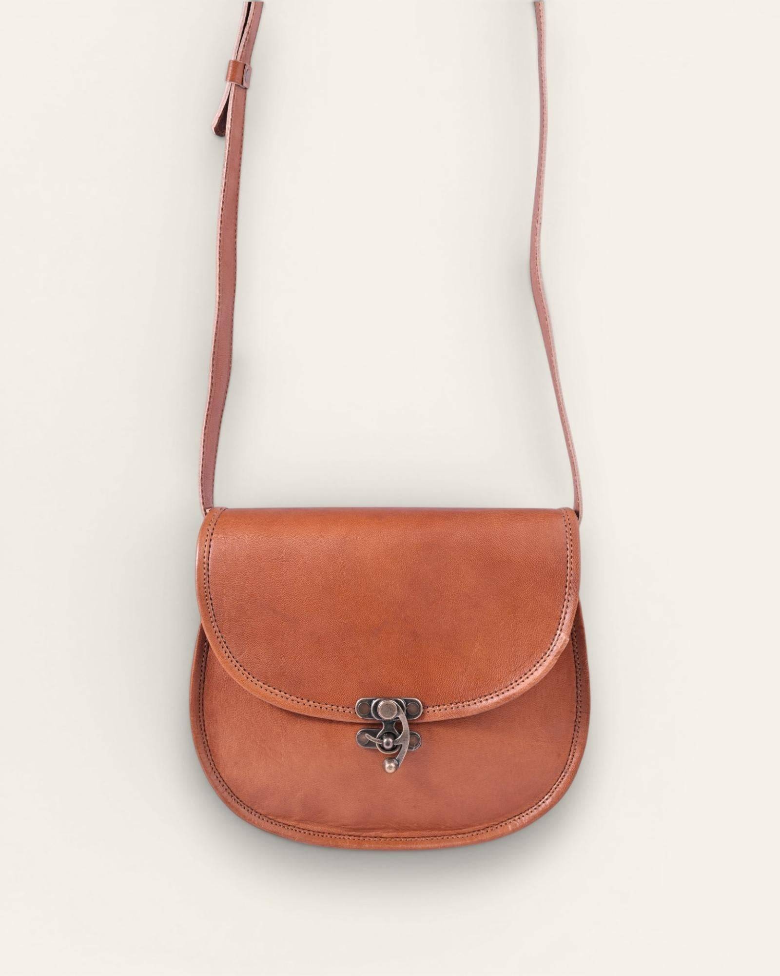 The Udaipur Saddle Bag — Certified Real Leather crossbody by artisan Pradeep