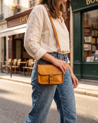 A mini real leather bag in tan color