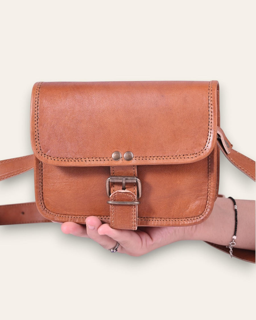 A mini real leather bag in tan color