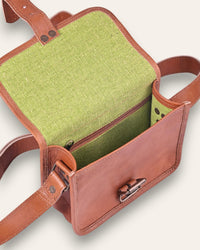 A mini real leather bag in tan color