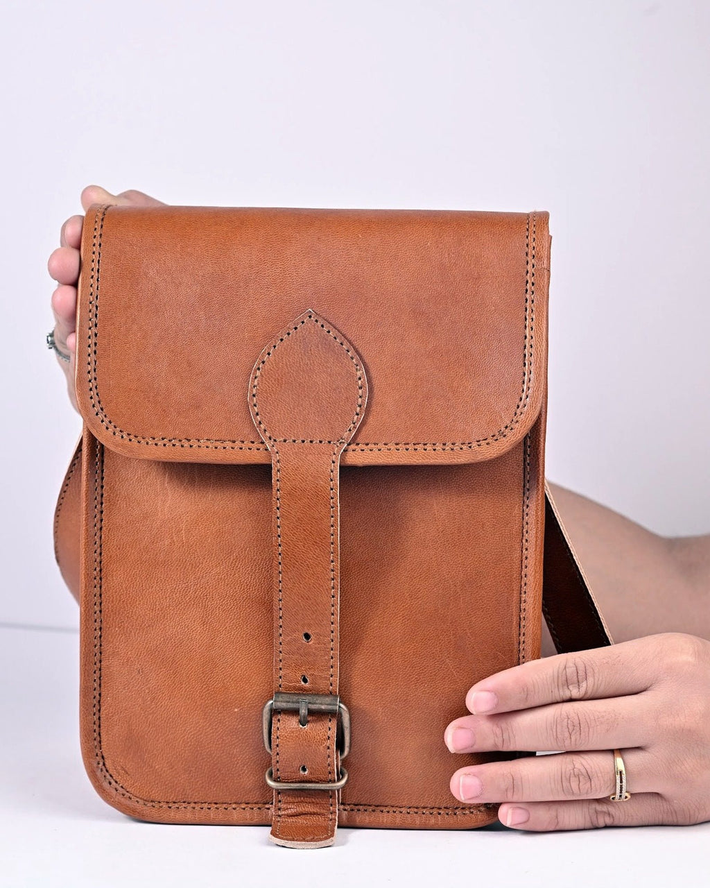 The Amer Sling — in hand for scale