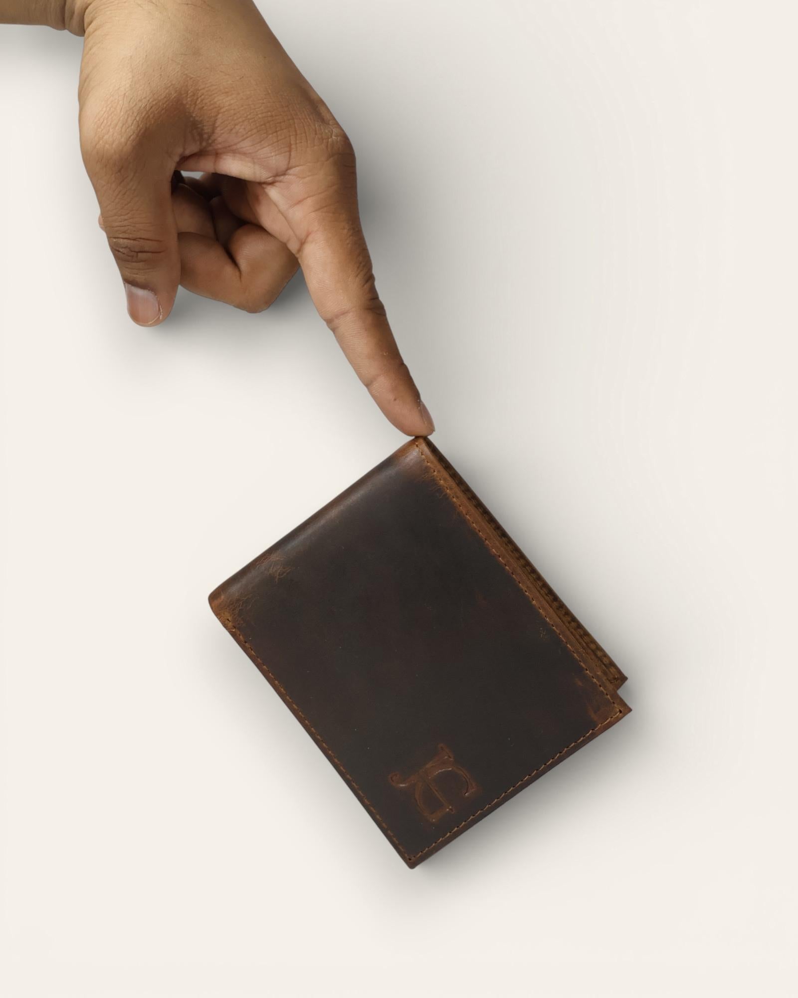 A real leather wallet with 2 cash compartments and a coin pocket