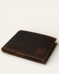 A real leather wallet with 2 cash compartments and a coin pocket